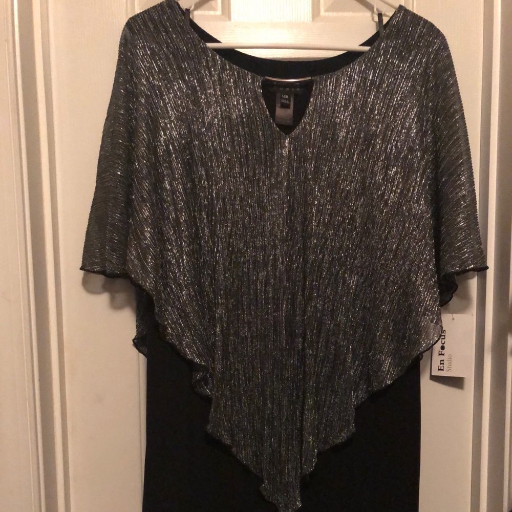 Women’s knee length dress.   New with tags